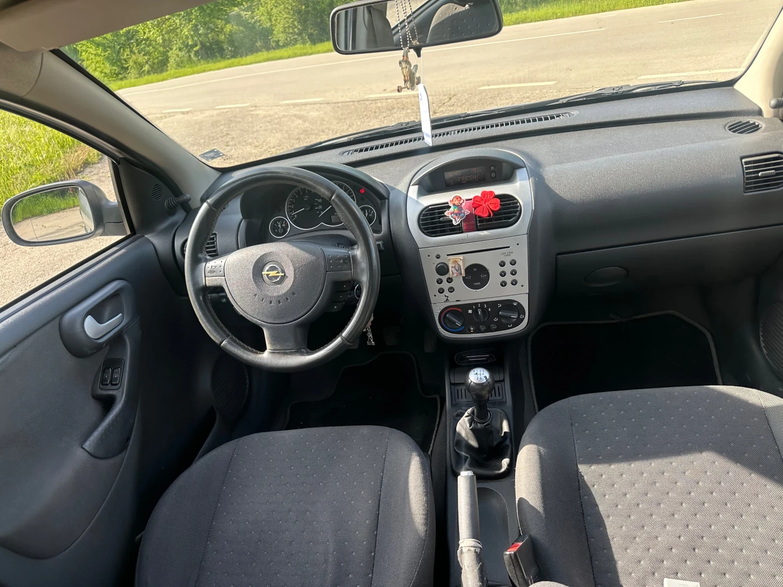 Opel Corsa 1.2, снимка 7 - Автомобили и джипове - 54494487