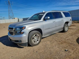 Chevrolet Suburban 5.3L 8 4x4 w/Rear Wheel Drv