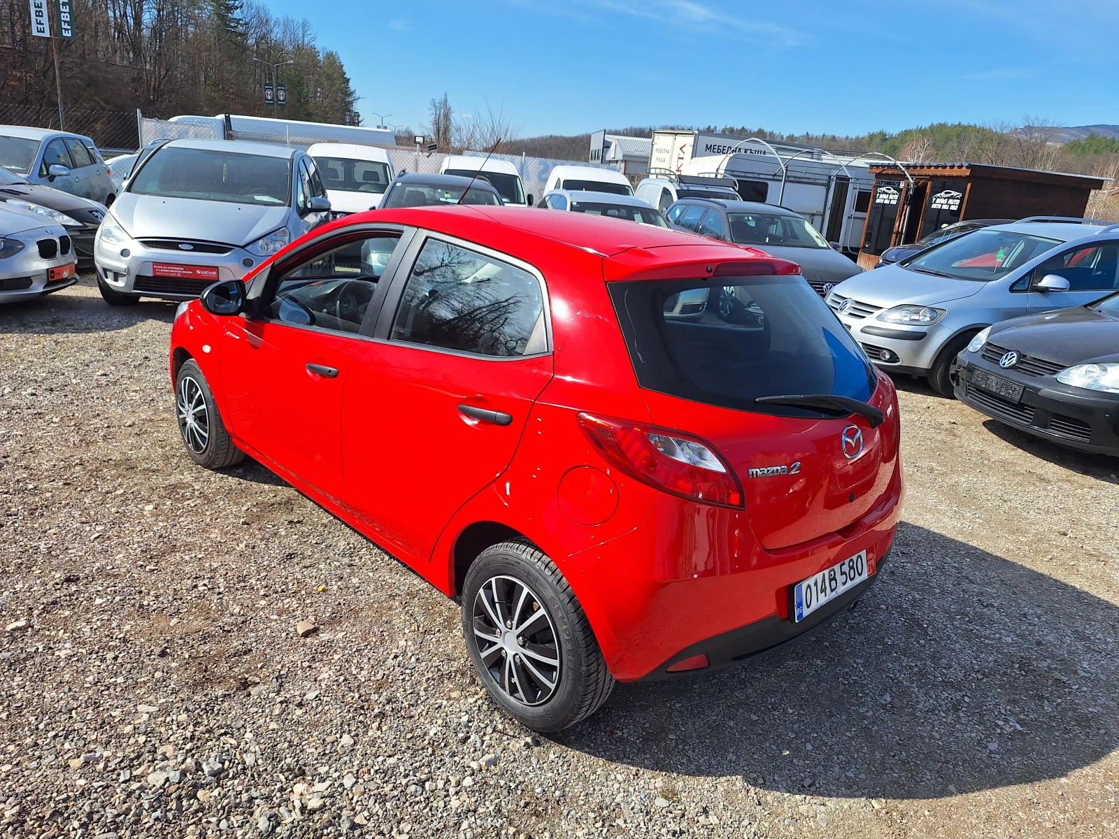 Mazda 2 1.3i, снимка 11 - Автомобили и джипове - 53826573