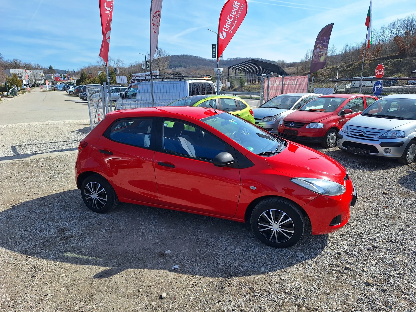 Mazda 2 1.3i, снимка 7 - Автомобили и джипове - 53826573