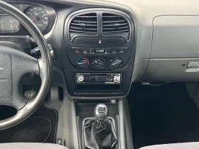Kia Sportage 2.0i 4x4 НАПЪЛНО ОБСЛУЖЕН, снимка 9