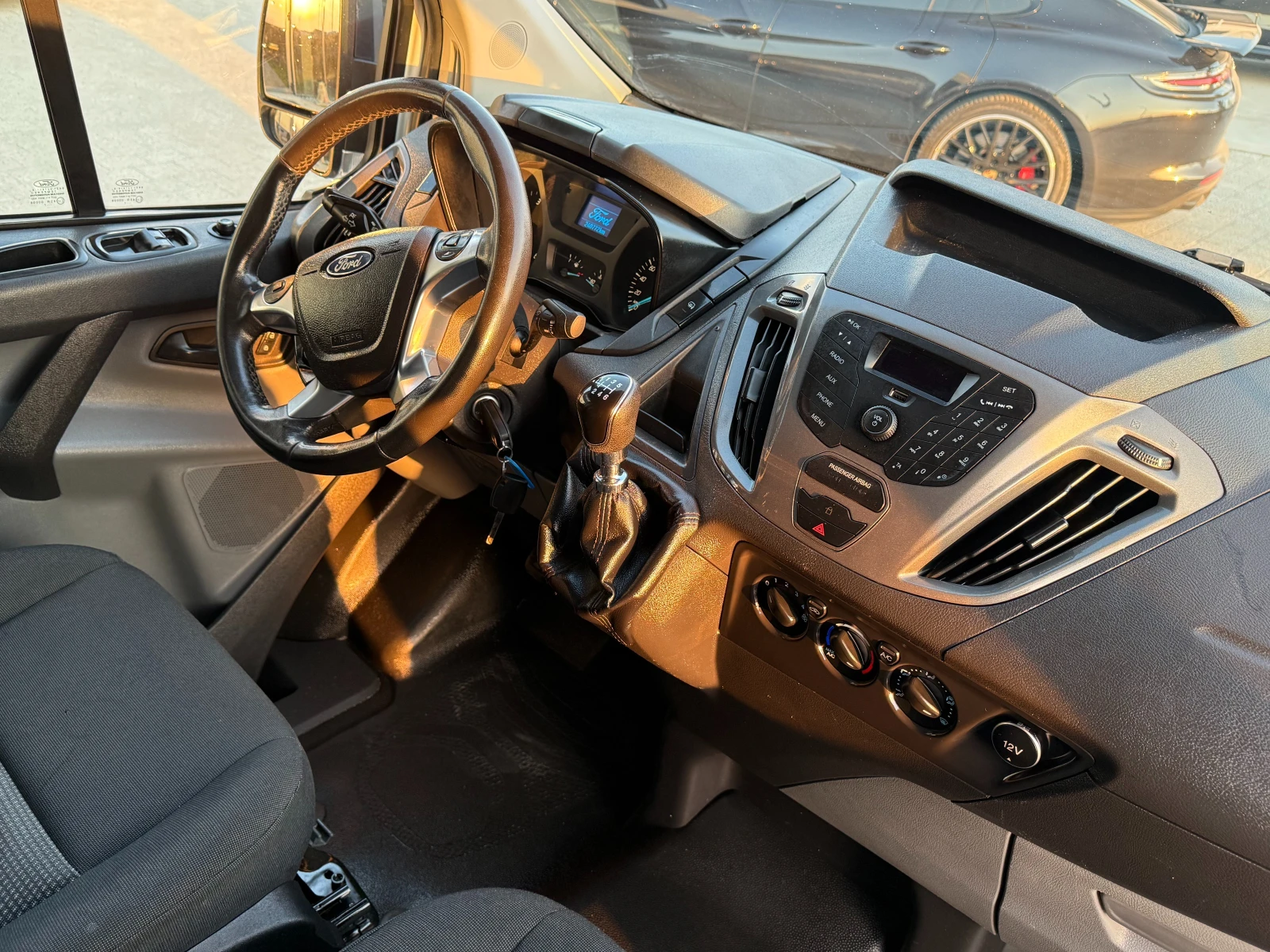 Ford Transit Custom 2.0TDCI L2H1 Клима Euro 6 , снимка 11 - Бусове и автобуси - 53864225