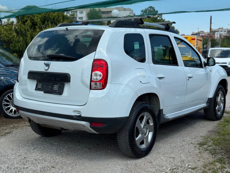 Dacia Duster 1.6i 4x4 KLIMATIK, снимка 6 - Автомобили и джипове - 50456652