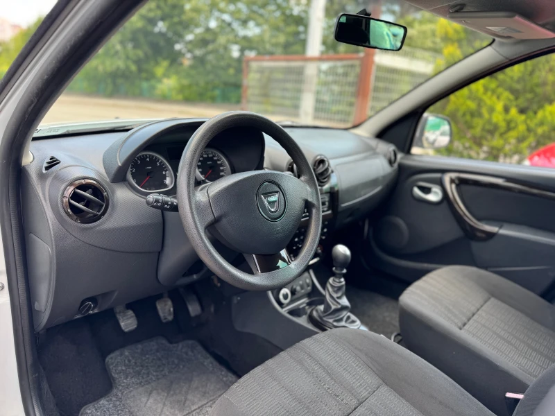 Dacia Duster 1.6i 4x4 KLIMATIK, снимка 7 - Автомобили и джипове - 50456652
