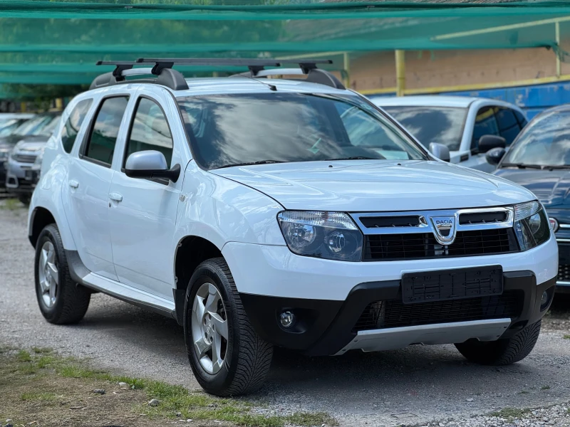 Dacia Duster 1.6i 4x4 KLIMATIK, снимка 3 - Автомобили и джипове - 50456652