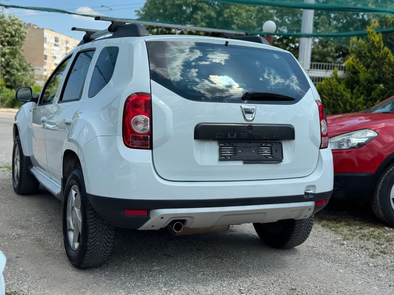 Dacia Duster 1.6i 4x4 KLIMATIK, снимка 5 - Автомобили и джипове - 50456652