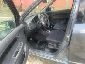 Suzuki Swift 1.3i 4x4 KLIMATIK | Mobile.bg    9
