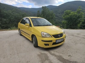 Suzuki Liana 1, 6i, ГАЗ.бензин - 1300 € / 2542.58 лв. - 85714155 2