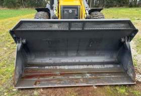 Багер New Holland B115C, снимка 13