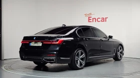 BMW 740 М ПАКЕТ/ОБДУХ/HUD/МАСАЖИ/360/ДИСТРОНИК/НОЩНО ВИЖ/, снимка 2