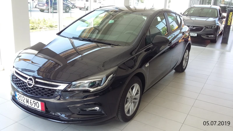 Opel Astra, снимка 14 - Автомобили и джипове - 53296276