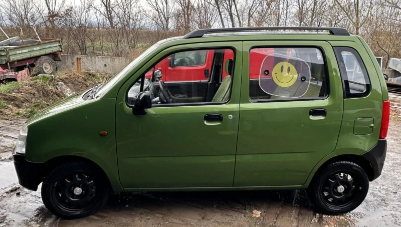 Opel Agila 1.0i, снимка 9 - Автомобили и джипове - 50321699