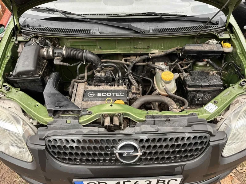 Opel Agila 1.0i, снимка 12 - Автомобили и джипове - 50321699