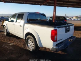 Nissan Frontier 4.0 V8 (CARFAX) | Mobile.bg    4