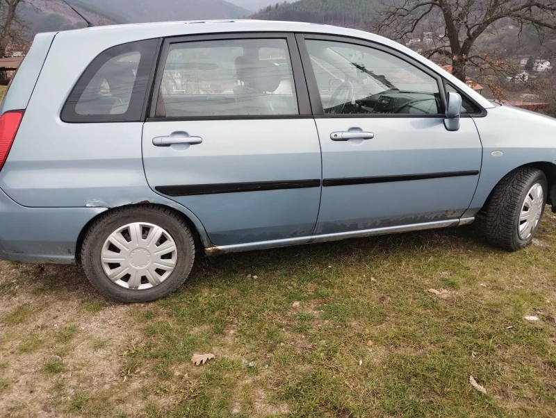 Suzuki Liana, снимка 5 - Автомобили и джипове - 48344145