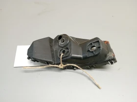 Водач, държач предна броня ляв Дайхатсу Сирион 1.3б 