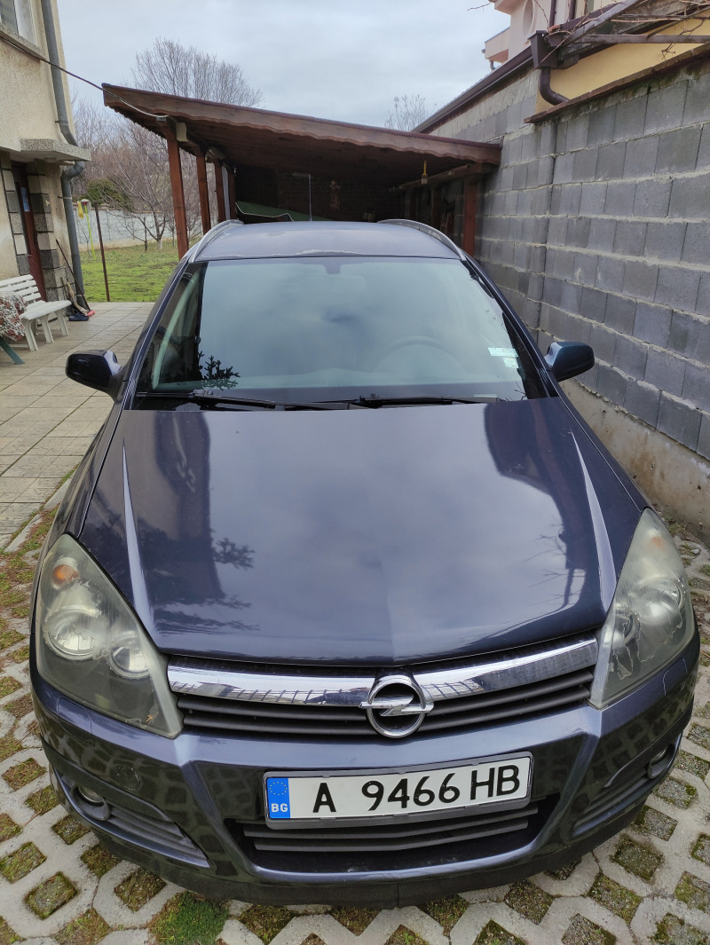 Opel Astra Комби, снимка 5 - Автомобили и джипове - 45623087