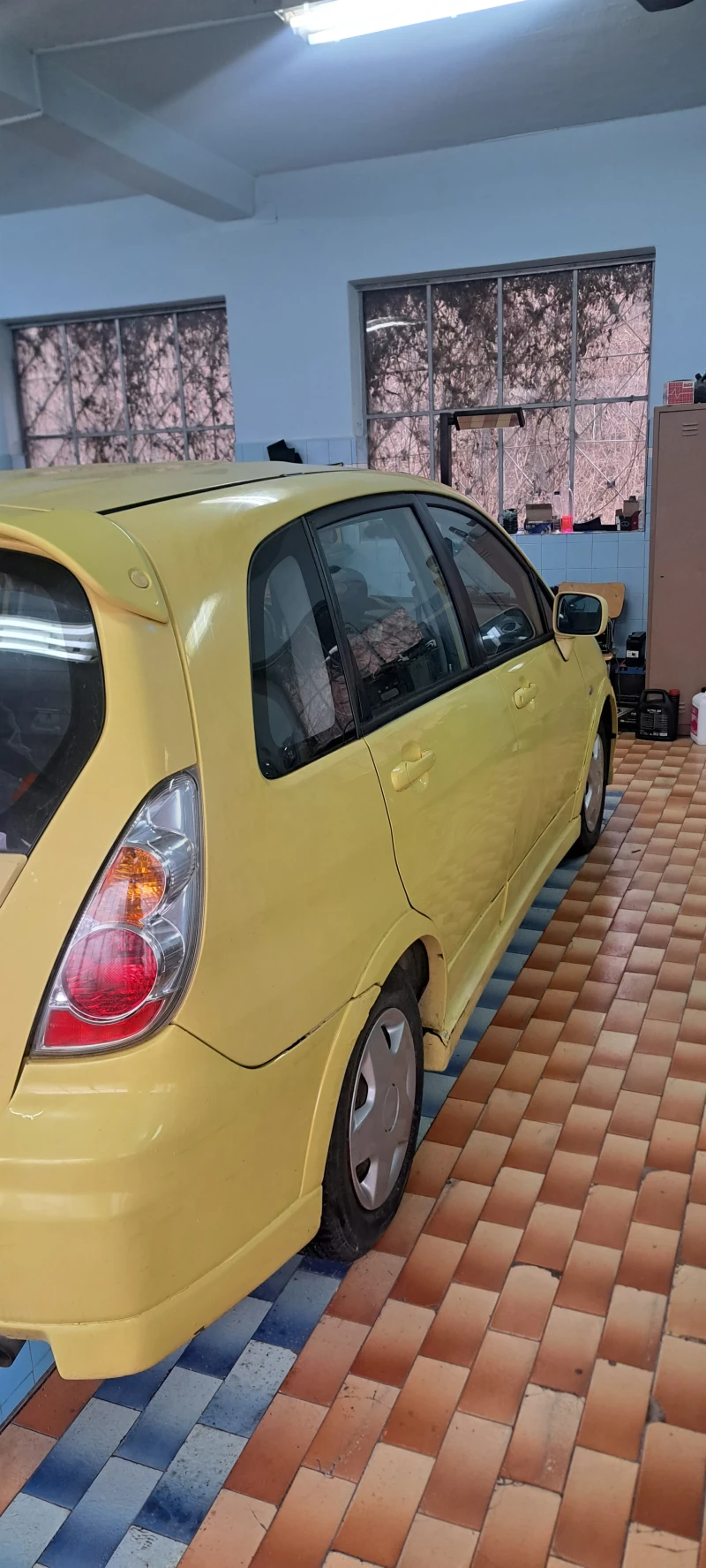 Suzuki Liana 1.6, снимка 12 - Автомобили и джипове - 53508045