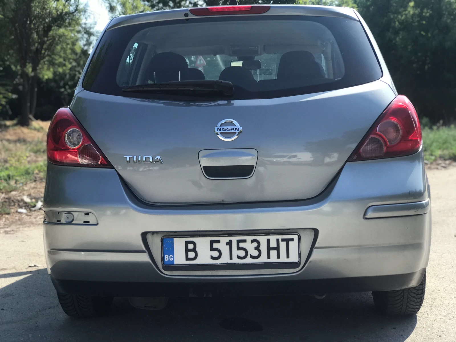 Nissan Tiida  - изображение 10