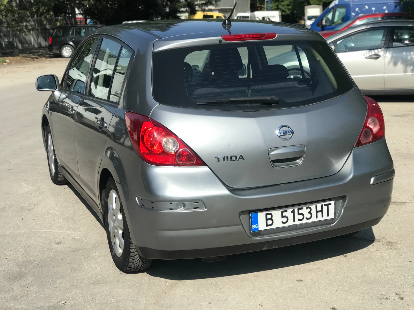 Nissan Tiida  - изображение 4