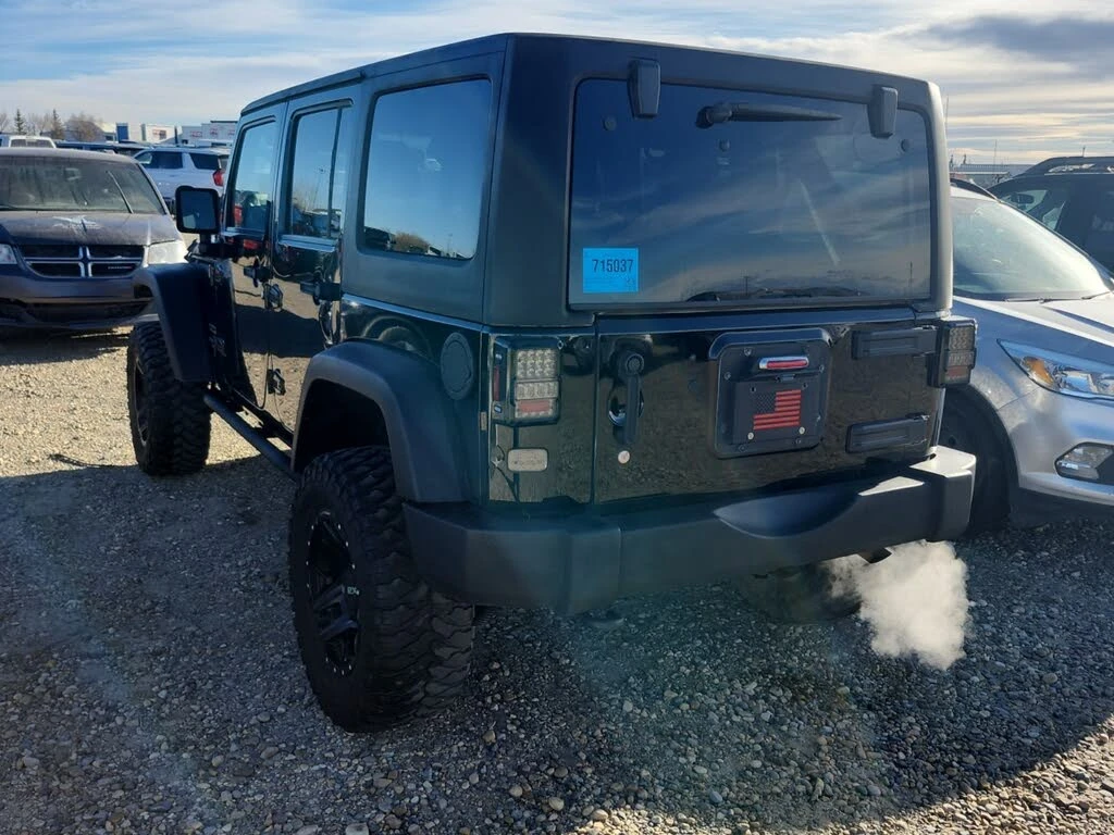 Jeep Wrangler Unlimited Sport*  - изображение 4