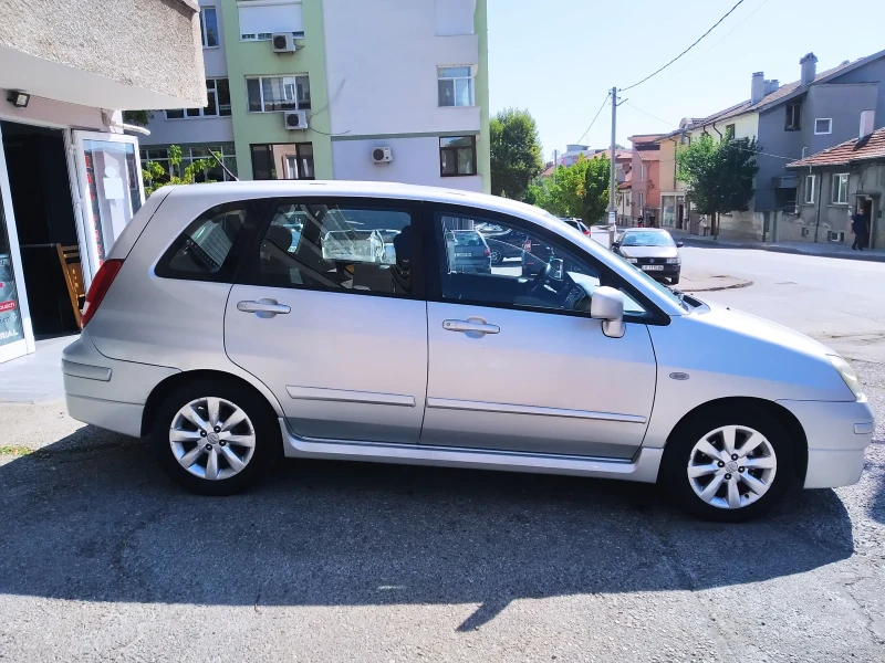 Suzuki Liana 1.4D 90кс., снимка 6 - Автомобили и джипове - 47342974