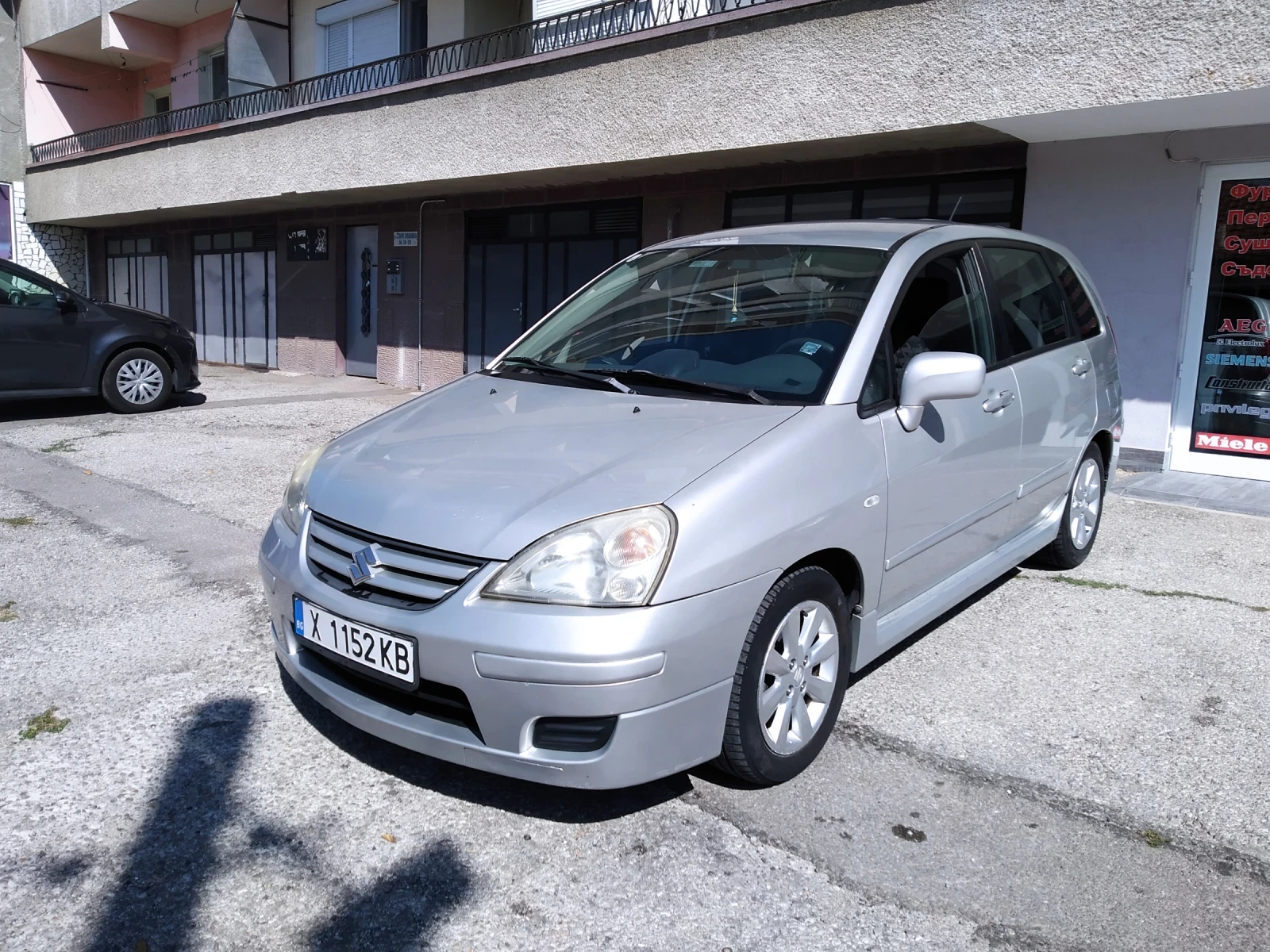 Suzuki Liana 1.4D 90кс. - изображение 3