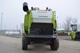 Комбайн Claas tucano450, снимка 11