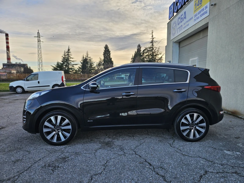 Kia Sportage 2.0 AWD CRDI, снимка 4 - Автомобили и джипове - 53046053