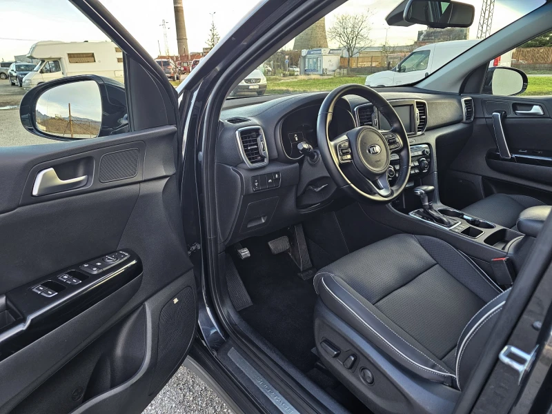 Kia Sportage 2.0 AWD CRDI, снимка 9 - Автомобили и джипове - 53046053