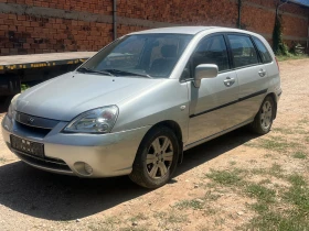 Suzuki Liana 1.6i 4X4 КЛИМАТИК РАБОТИ 135000 КМ, снимка 2
