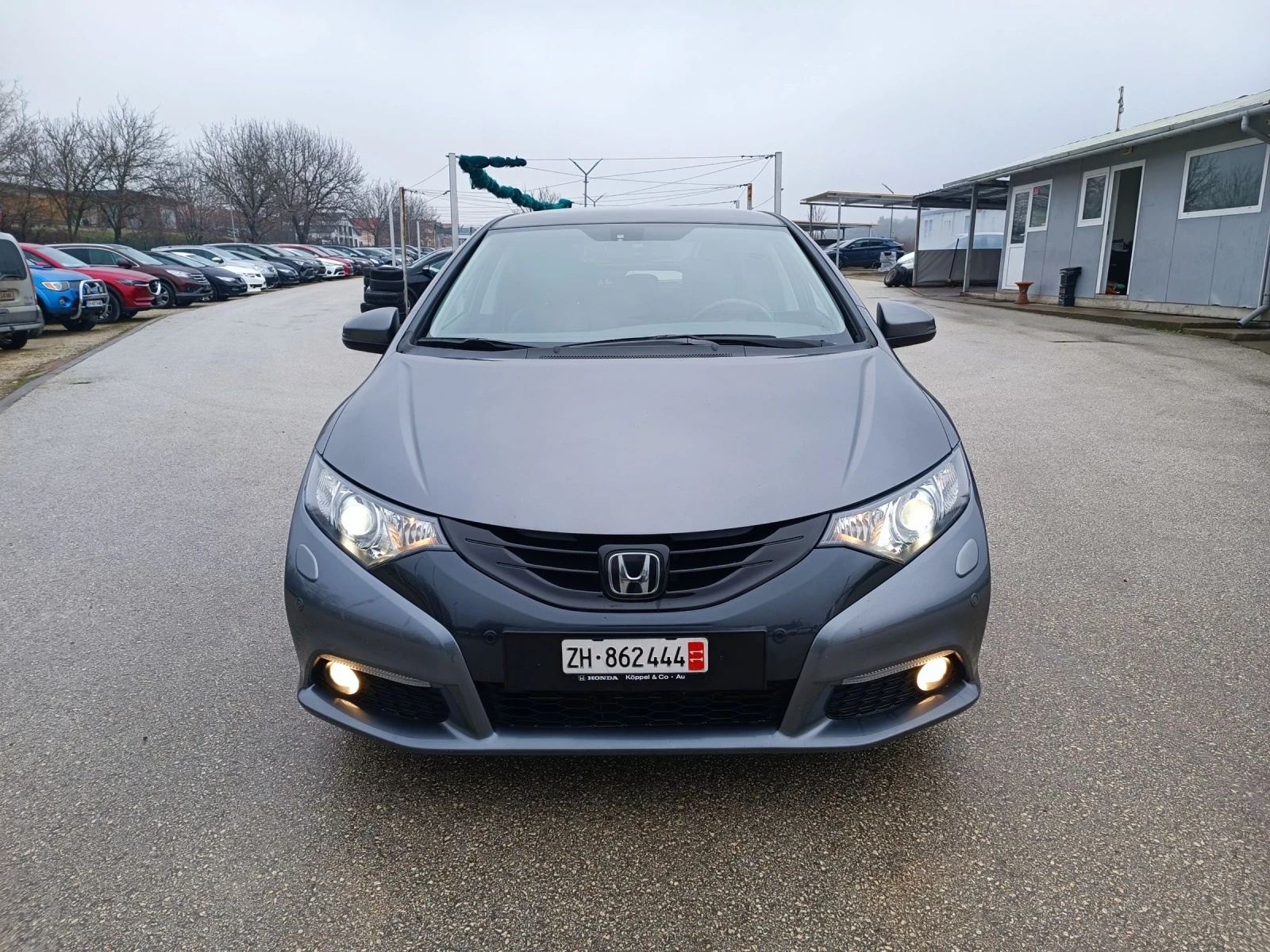 Honda Civic 1.8i-140кс-ШВЕЙЦАРИЯ-РЪЧКА-6ск-ДИСТРОНИК-NAVI, снимка 1
