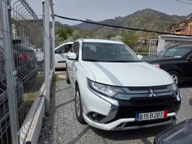Mitsubishi Outlander 2.4 .Plug -in Hibrid 4WD , снимка 2