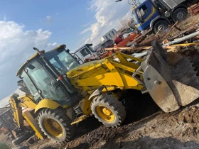 Багер Komatsu WB91, снимка 3