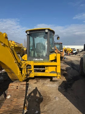 Багер Komatsu WB91, снимка 1