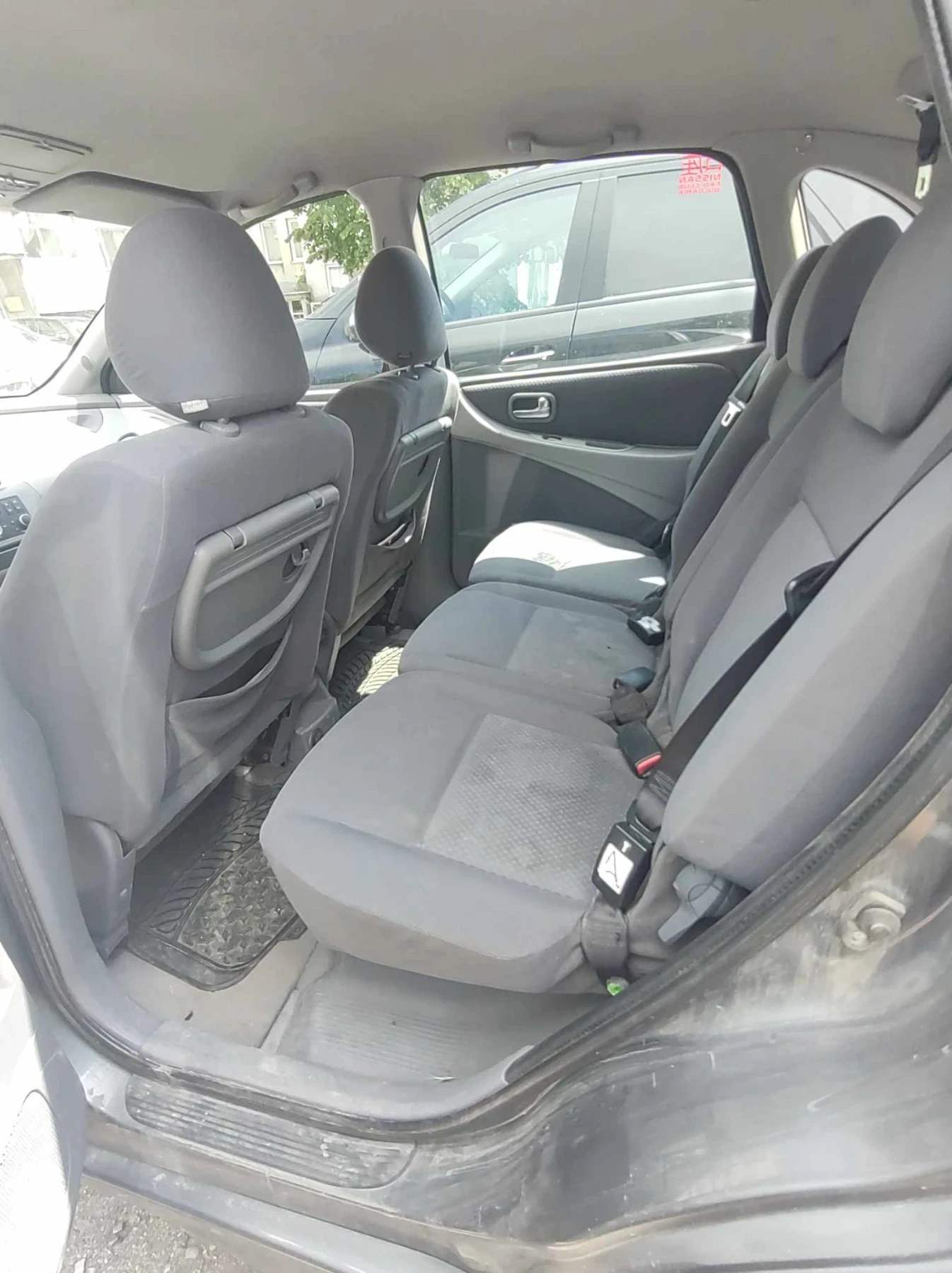 Nissan Almera tino  - изображение 4