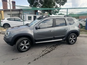 Dacia Duster 1.2i 4x4 - 17987 лв. - 32552403 5