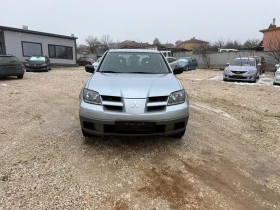 Mitsubishi Outlander 2.0i-БЕНЗИН-КОМФОРТ 164000км. - 3470 € / 6786.73 лв. - 88088721 2