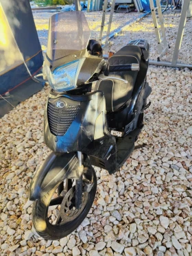     Kymco People S