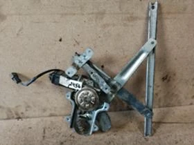 Стъклоповдигач заден ляв Ssangyong Musso  , снимка 1