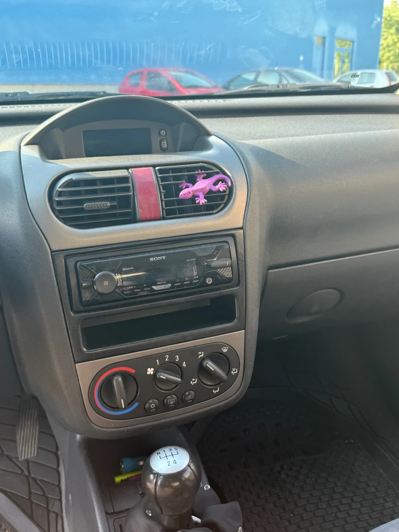 Opel Corsa, снимка 8 - Автомобили и джипове - 52695342
