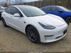 Tesla Model 3 STANDARD RANGE PLUS REAR-WHEEL DRIVE