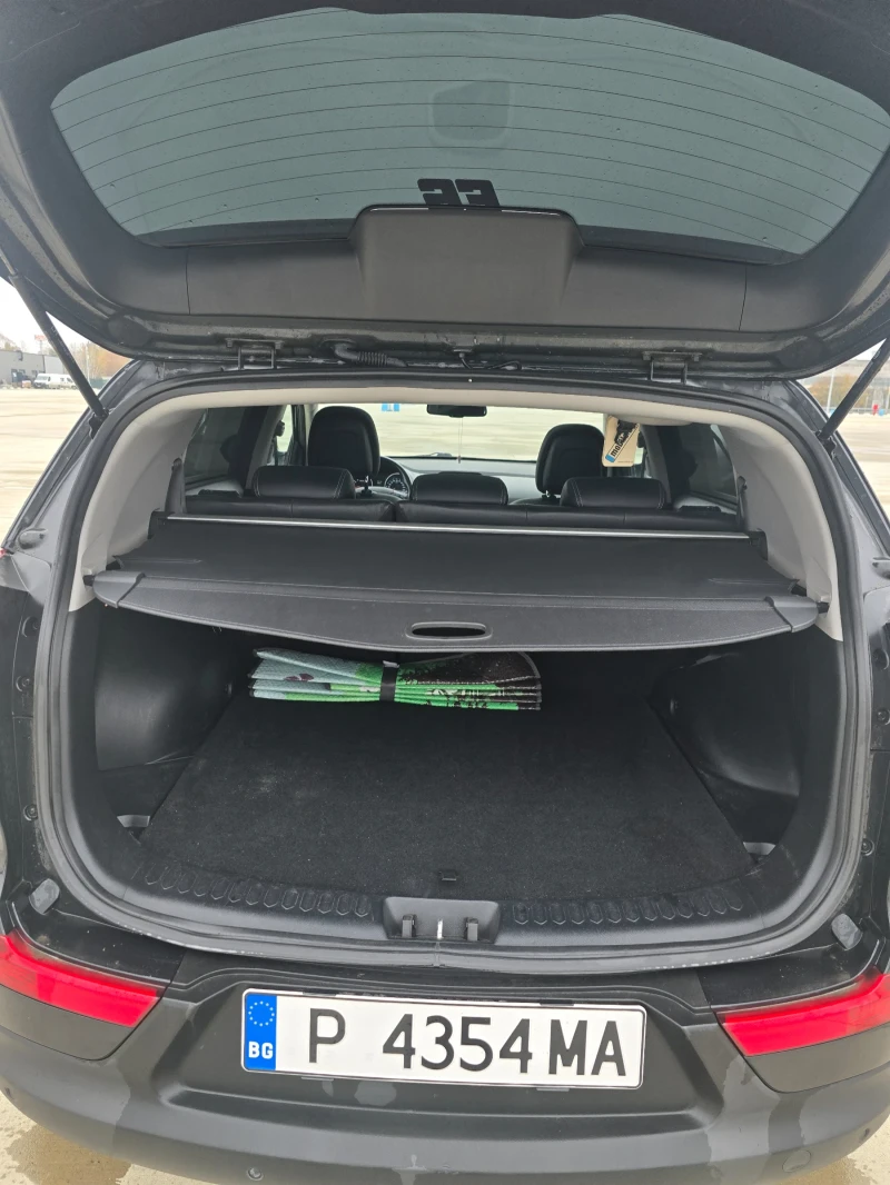Kia Sportage, снимка 12 - Автомобили и джипове - 52481562