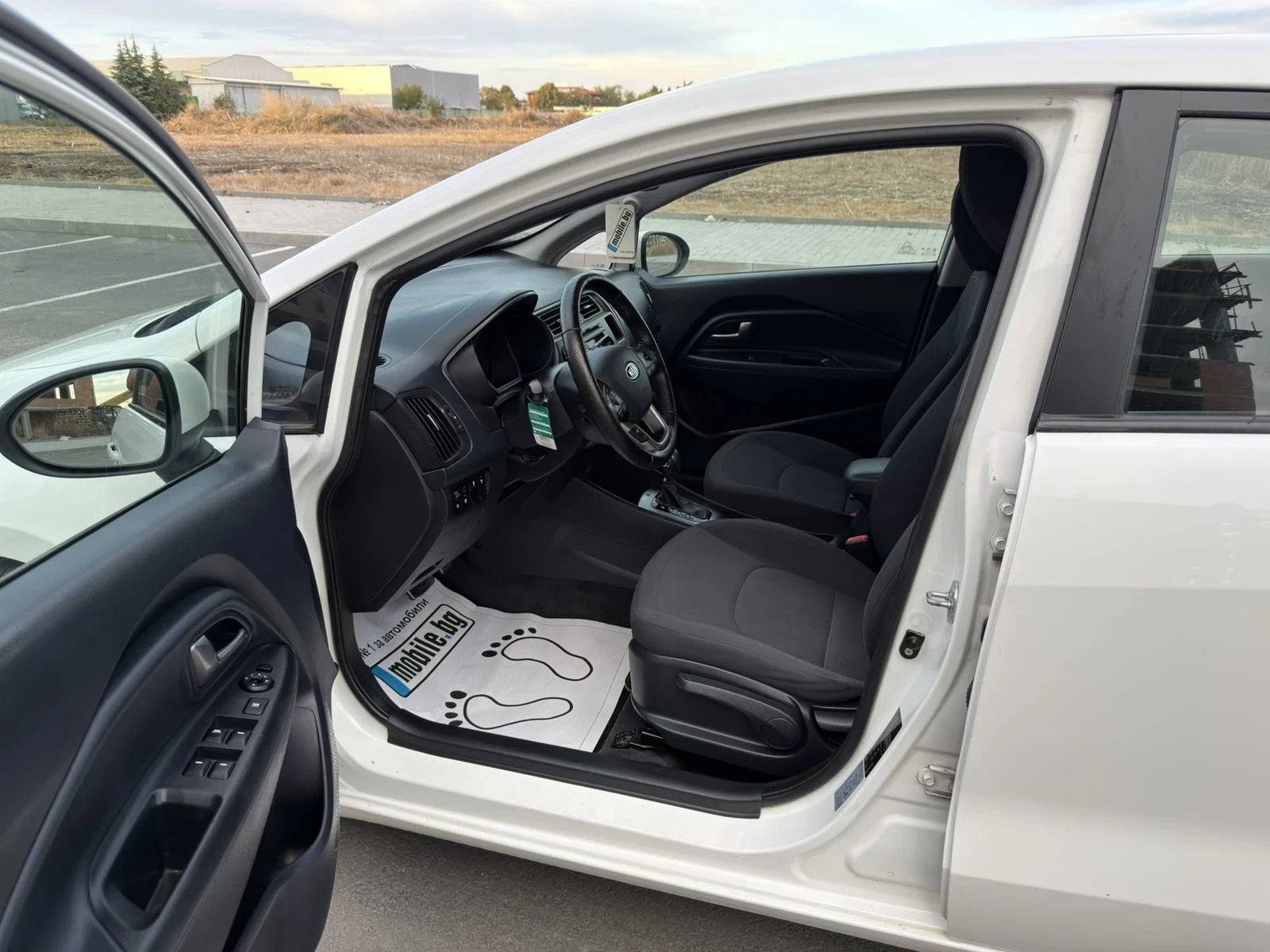 Kia Rio 1.4i STYLE, снимка 9 - Автомобили и джипове - 56404247