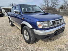Nissan Navara 2.5TD/103к.с* Внос от Италия, снимка 3