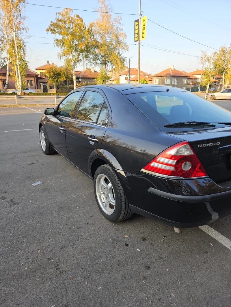 Ford Mondeo 2.0i GHIA, снимка 11 - Автомобили и джипове - 47778465