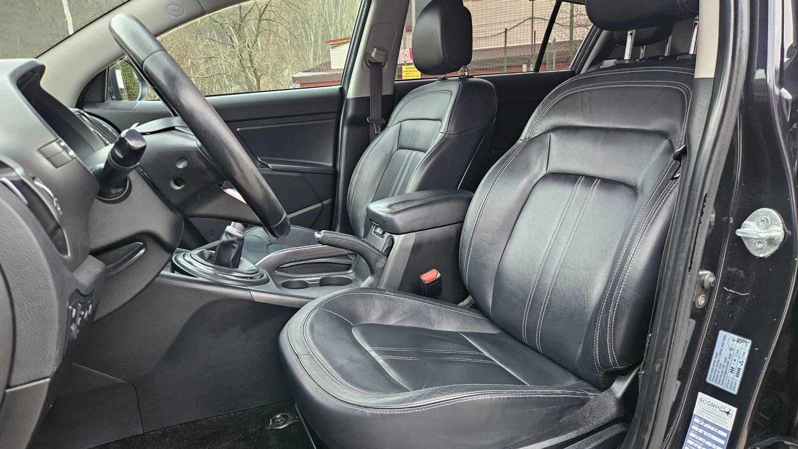 Kia Sportage 1.7 Crdi NAVIG/KOJA/KLIMA/6skorosti, снимка 12 - Автомобили и джипове - 53782291