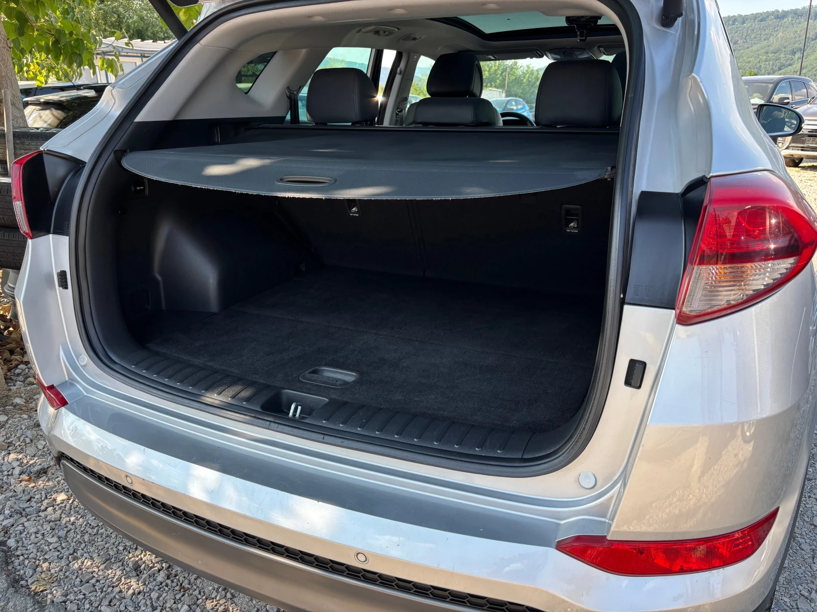 Hyundai Tucson 2.0 crdi 4x4, снимка 12 - Автомобили и джипове - 55738110