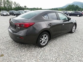 Mazda 3 2.0i kli navi 120 - 15900 лв. - 14327102 | Car24.bg