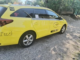 Toyota Auris Хибрид газ  | Auto.bg — изображение 4